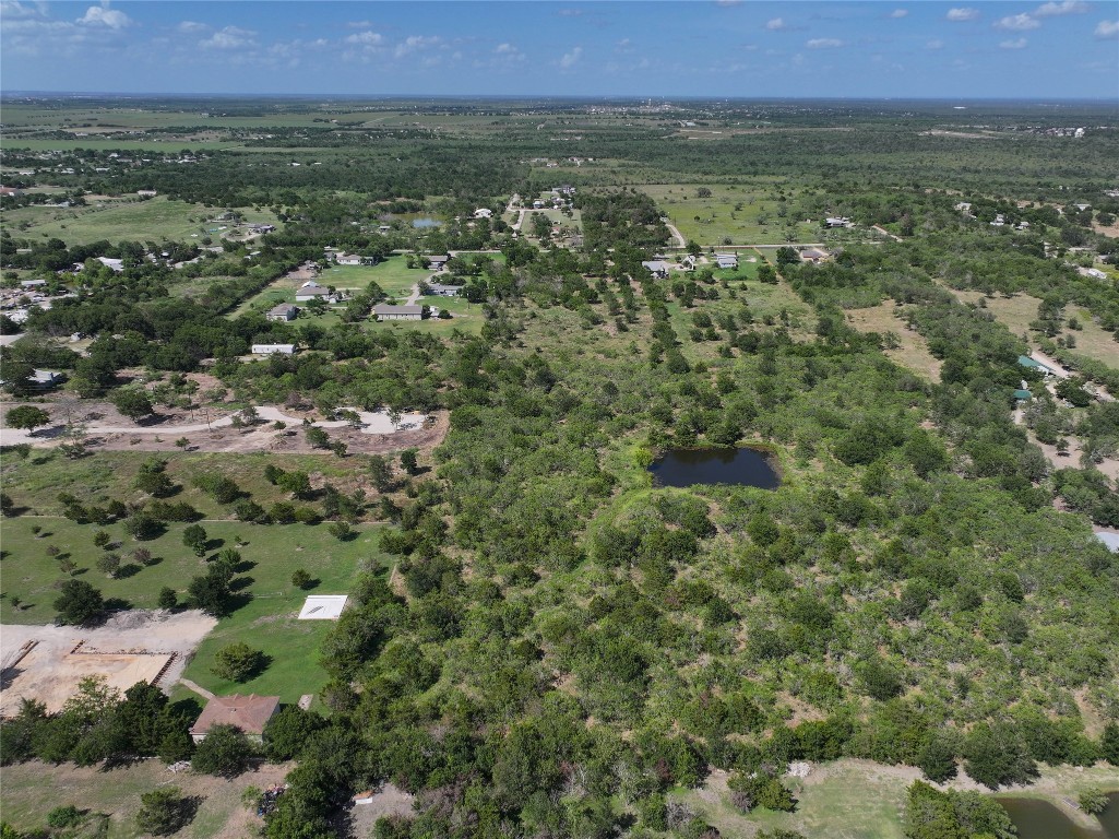 983 Long Hollow Road Dale, TX 78616 - Photo 4 of 8 a view of a field with a houses