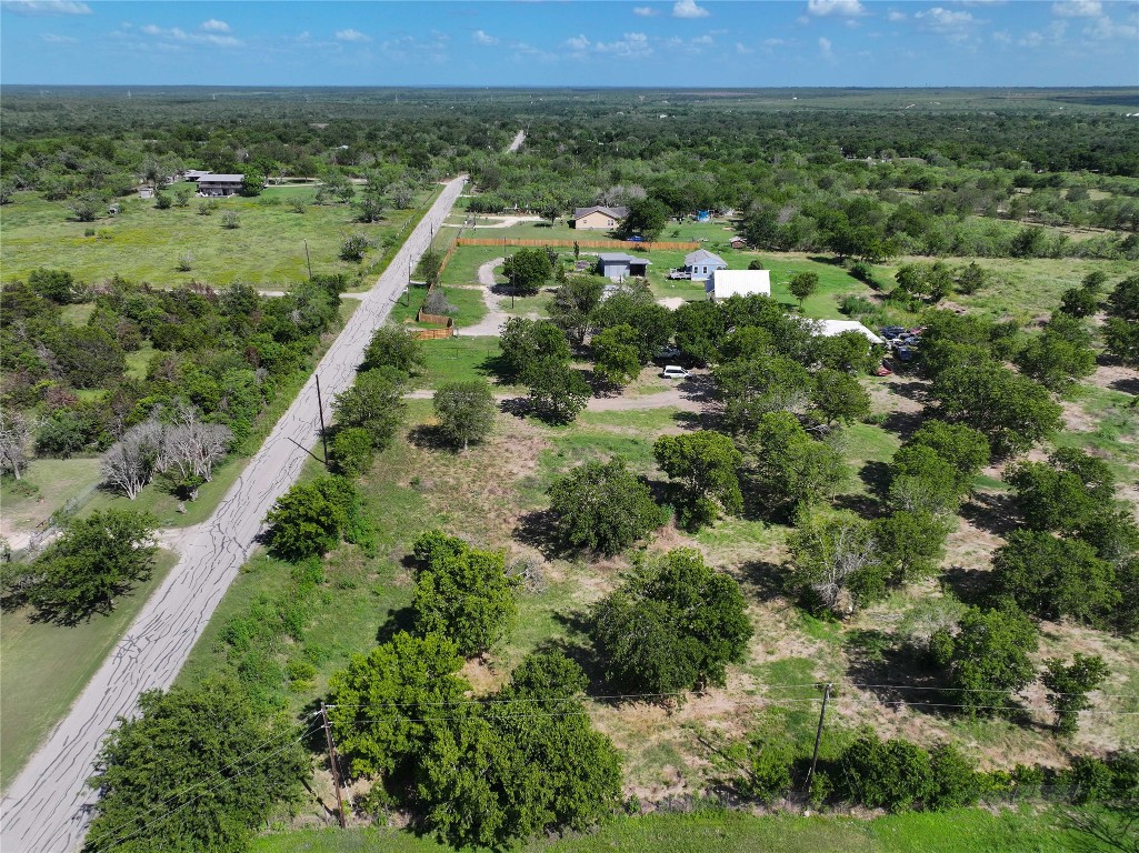 983 Long Hollow Road Dale, TX 78616 - Photo 5 of 8 an aerial view of a house with a yard