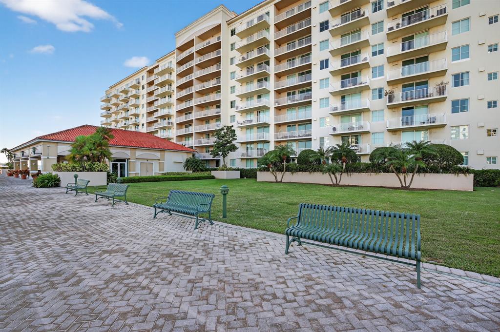 3020 Northeast 32nd Avenue, Unit 1207 Fort Lauderdale, FL 33308 - Photo 44 of 69 a view of a building with a yard
