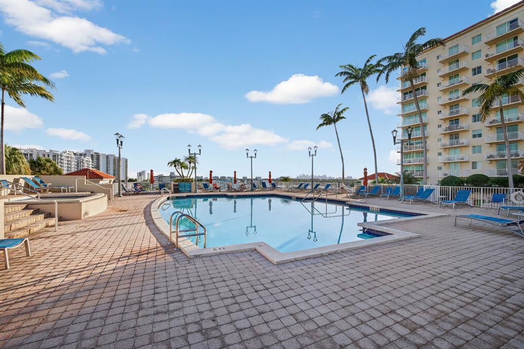 3020 Northeast 32nd Avenue, Unit 1207 Fort Lauderdale, FL 33308 - Photo 50 of 69 a view of swimming pool with outdoor seating