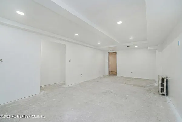 a view of a livingroom with a kitchen