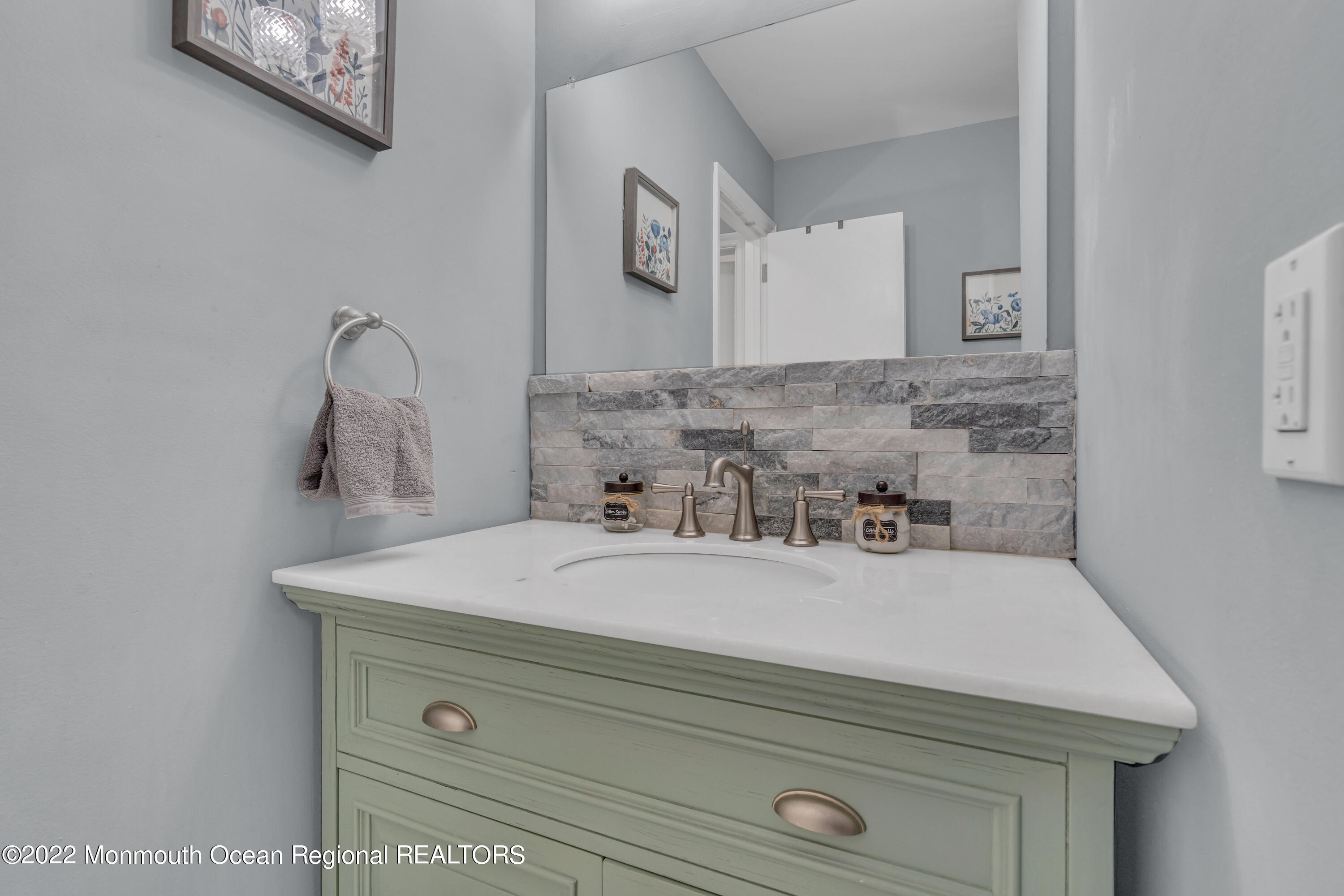 176 Pinehurst Road Brick, NJ 08723 - Photo 26 of 55 a bathroom with a sink and vanity