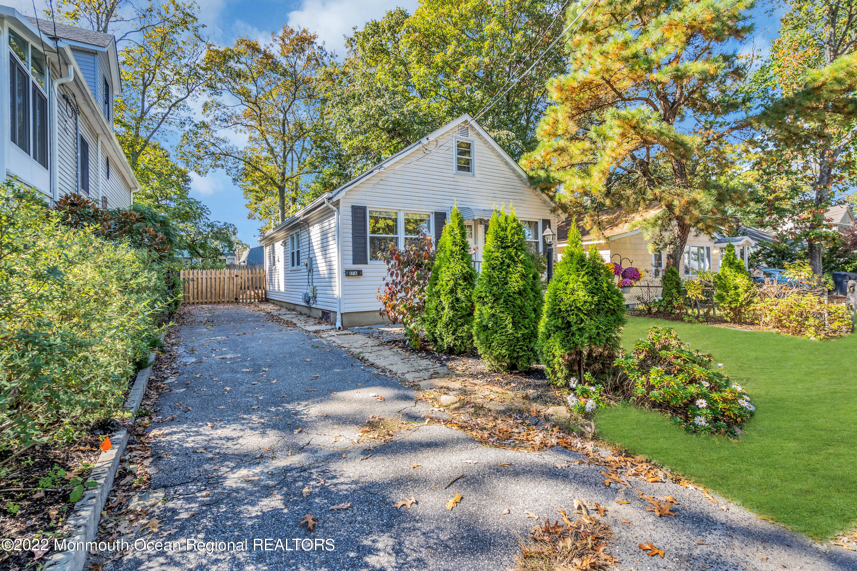 176 Pinehurst Road Brick, NJ 08723 - Photo 4 of 55 a front view of a house with garden