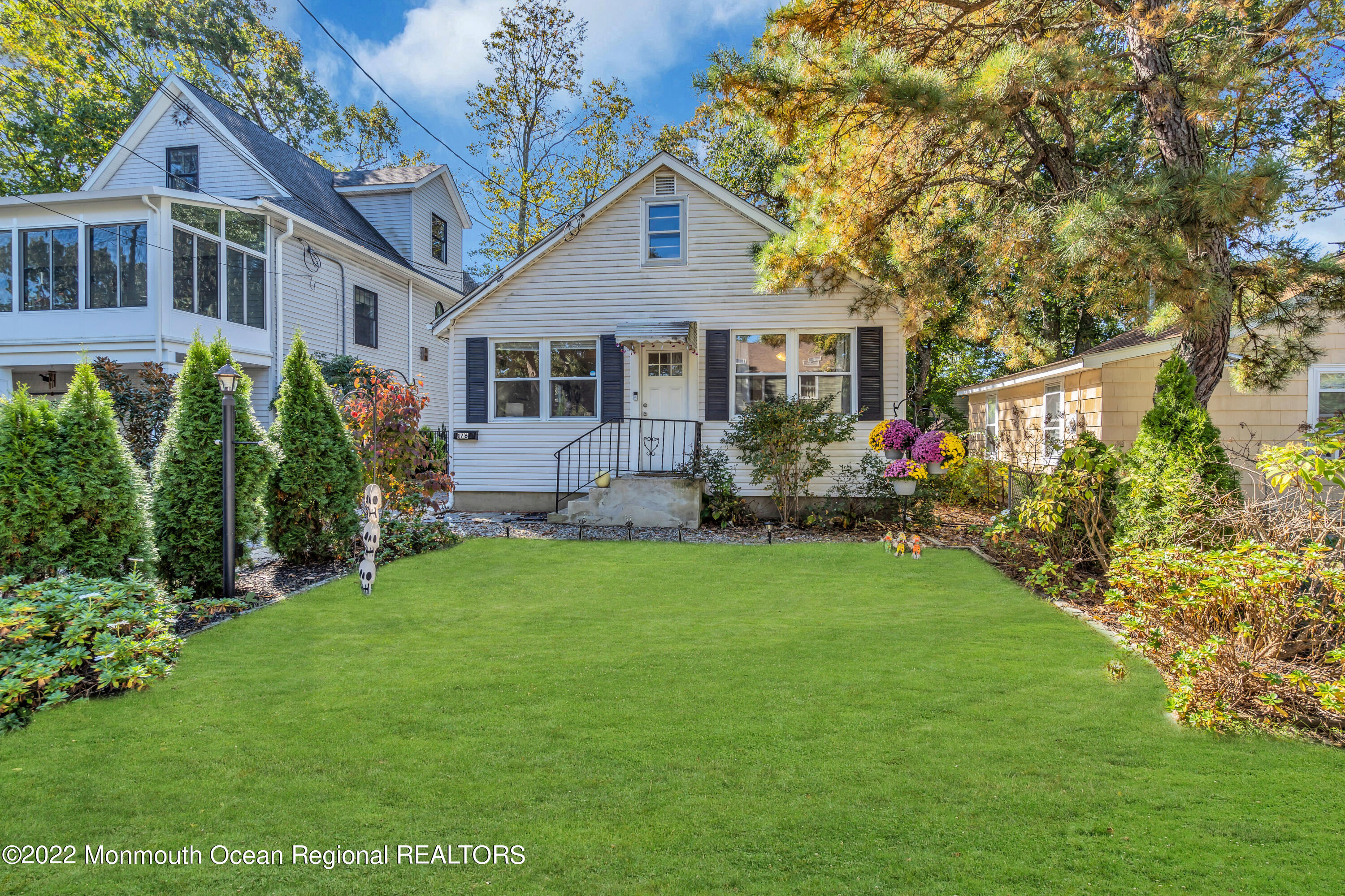 176 Pinehurst Road Brick, NJ 08723 - Photo 52 of 55 a front view of house with yard and green space