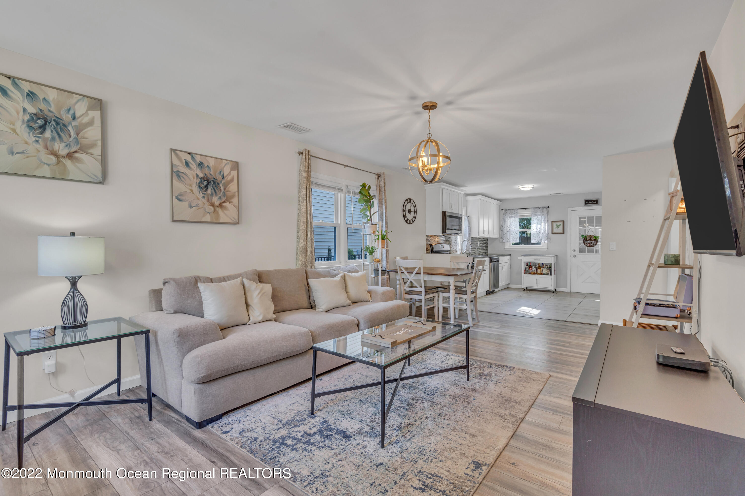 176 Pinehurst Road Brick, NJ 08723 - Photo 7 of 55 a living room with furniture and a flat screen tv