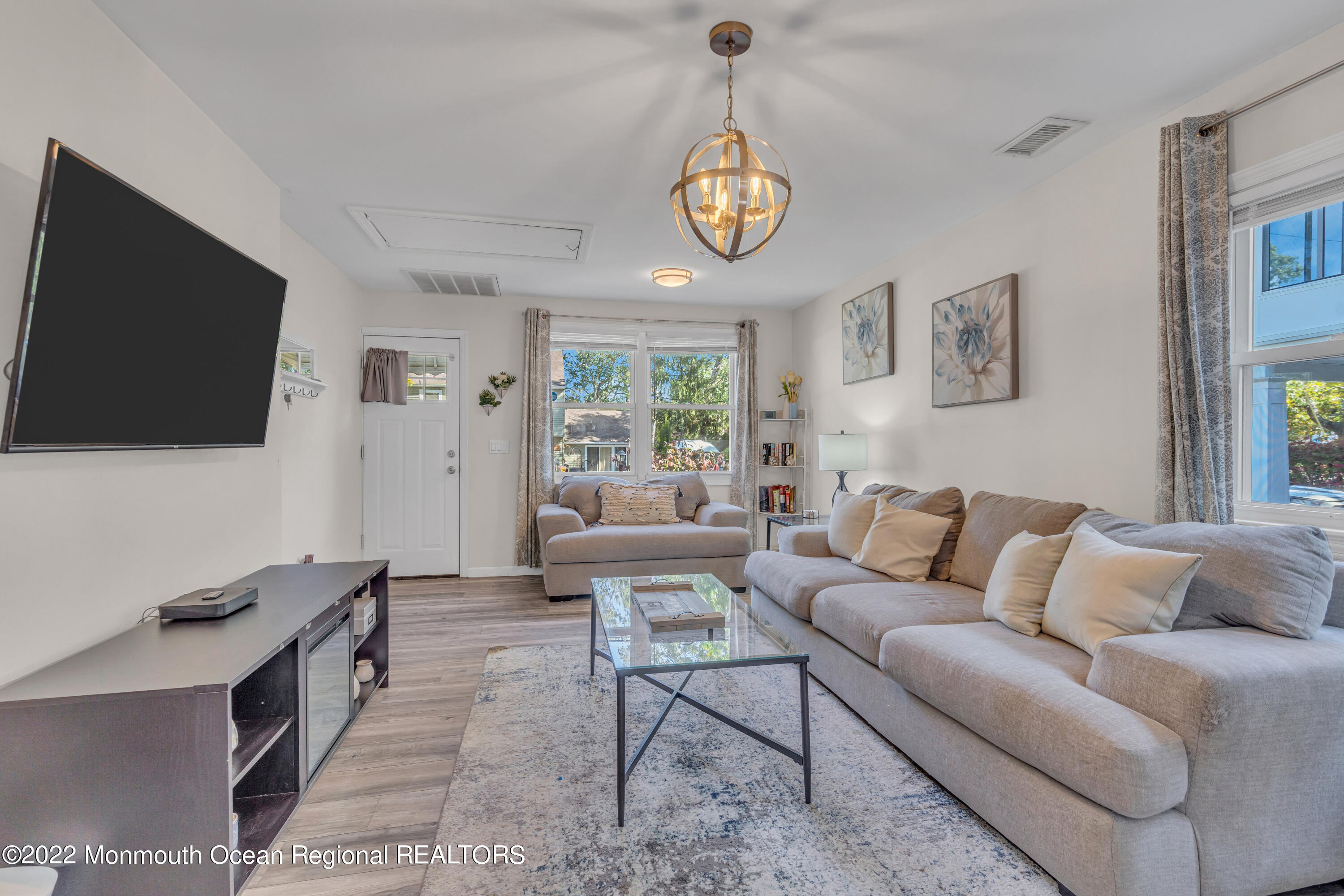 176 Pinehurst Road Brick, NJ 08723 - Photo 10 of 55 a living room with furniture and a flat screen tv