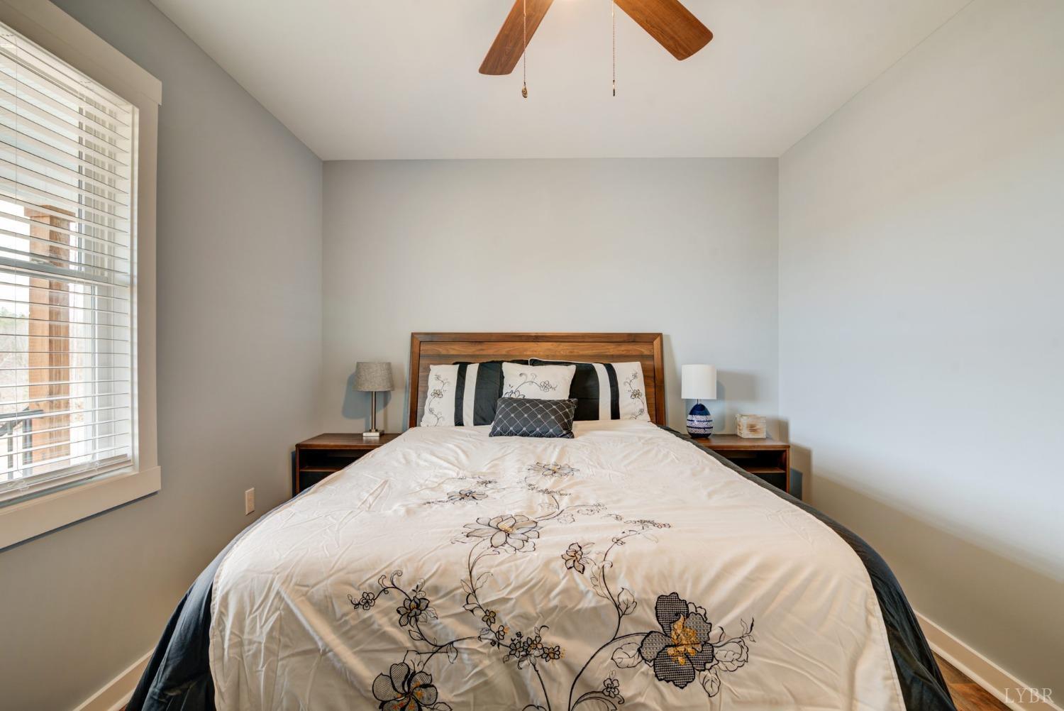 701 Winfall Road Rustburg, VA 24554 - Photo 18 of 38 a bedroom with a bed and a window
