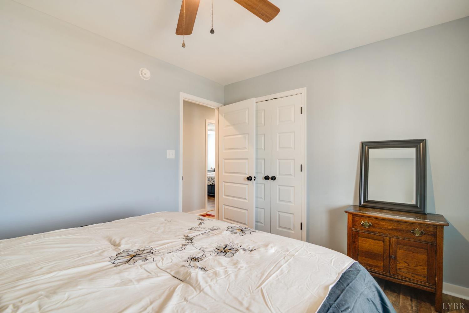 701 Winfall Road Rustburg, VA 24554 - Photo 19 of 38 a bedroom with a bed and a dresser