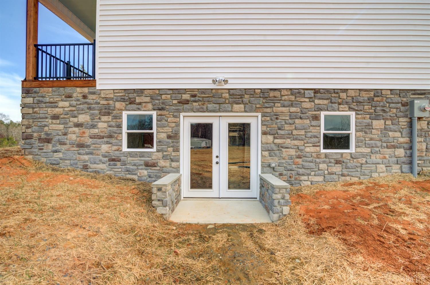 701 Winfall Road Rustburg, VA 24554 - Photo 29 of 38 a view of a house with a yard and wooden fence
