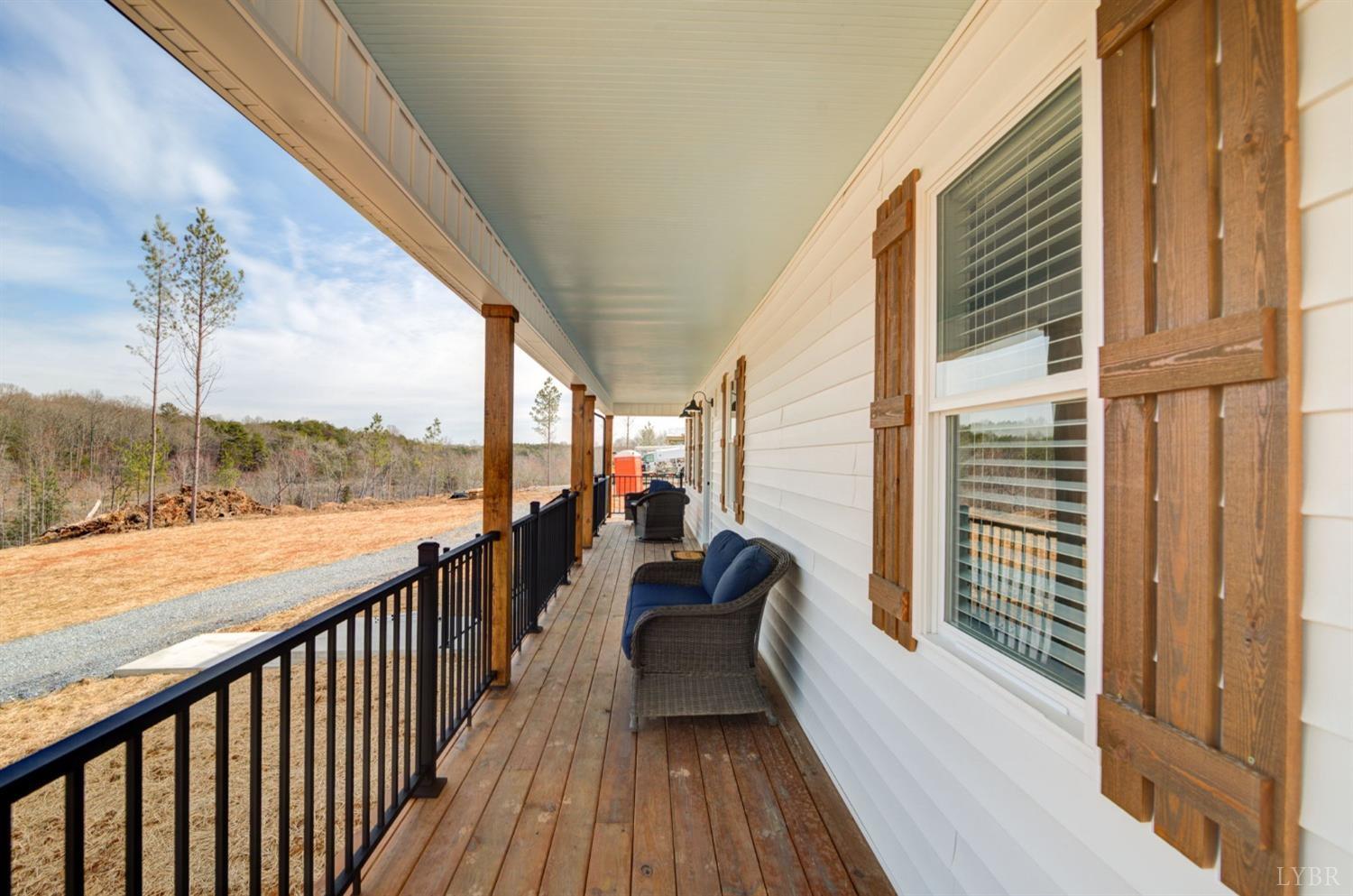 701 Winfall Road Rustburg, VA 24554 - Photo 3 of 38 a view of balcony with couch