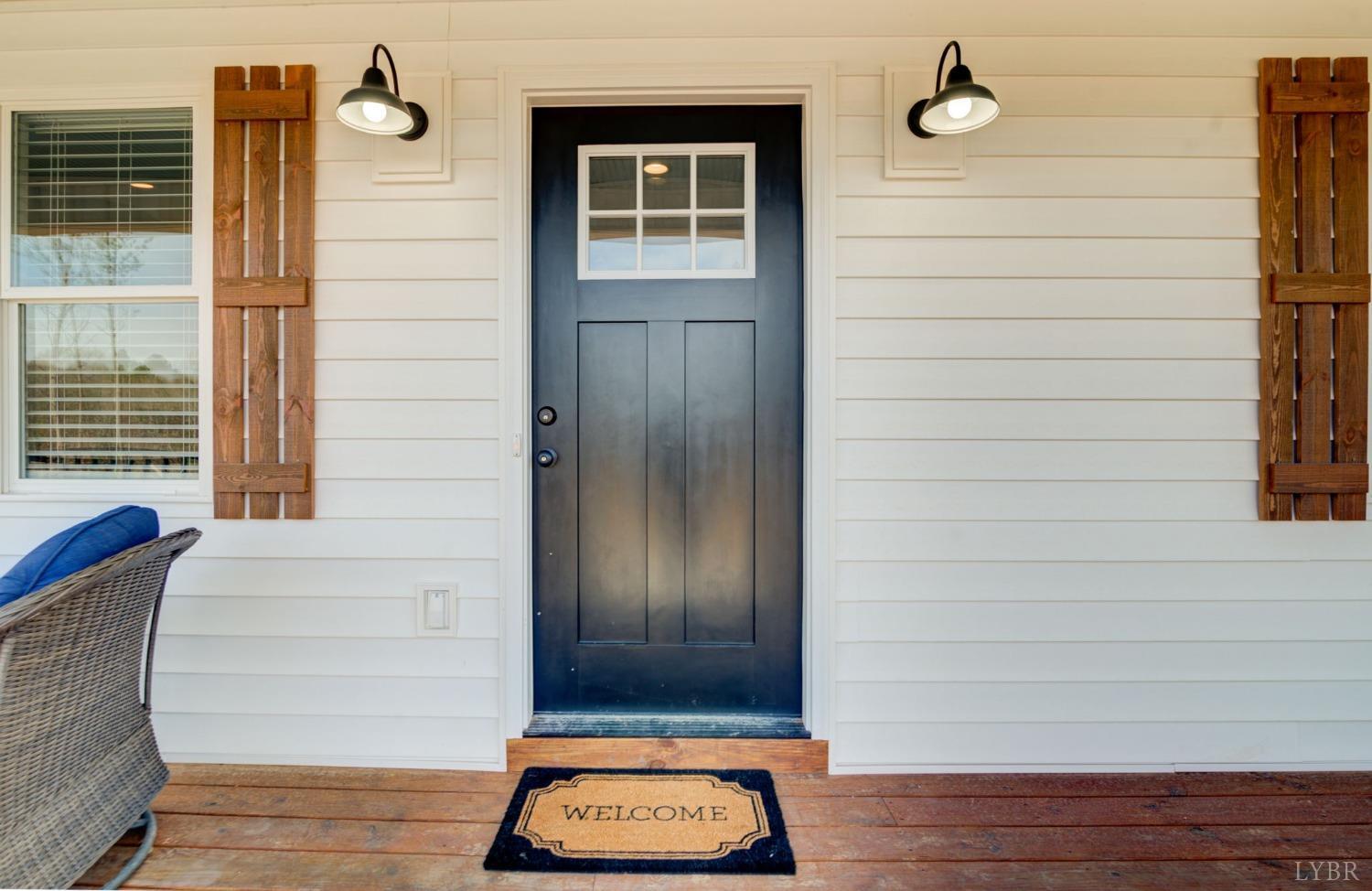 701 Winfall Road Rustburg, VA 24554 - Photo 4 of 38 a view of front door and porch with wooden floor