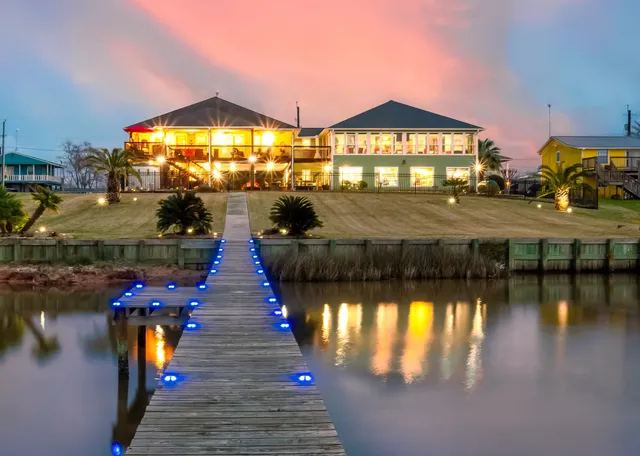 a view of a swimming pool with lounge chair