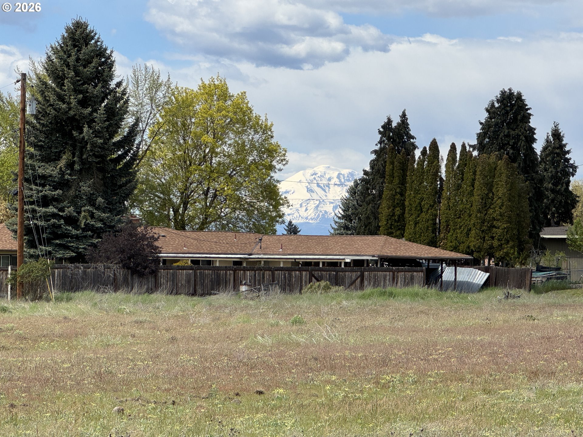 0 East Collins Street Goldendale, WA 98620 - Photo 13 of 15 a view of a house with a yard