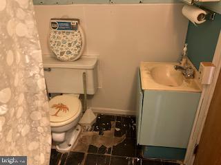 123 South 10th Street Reading, PA 19602 - Photo 6 of 16 a bathroom with a toilet and a sink