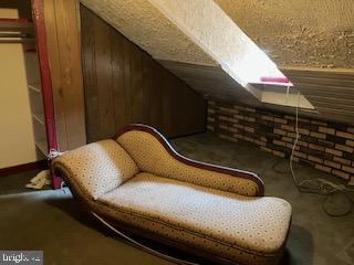 123 South 10th Street Reading, PA 19602 - Photo 10 of 16 a bed sitting in a bedroom next to a window