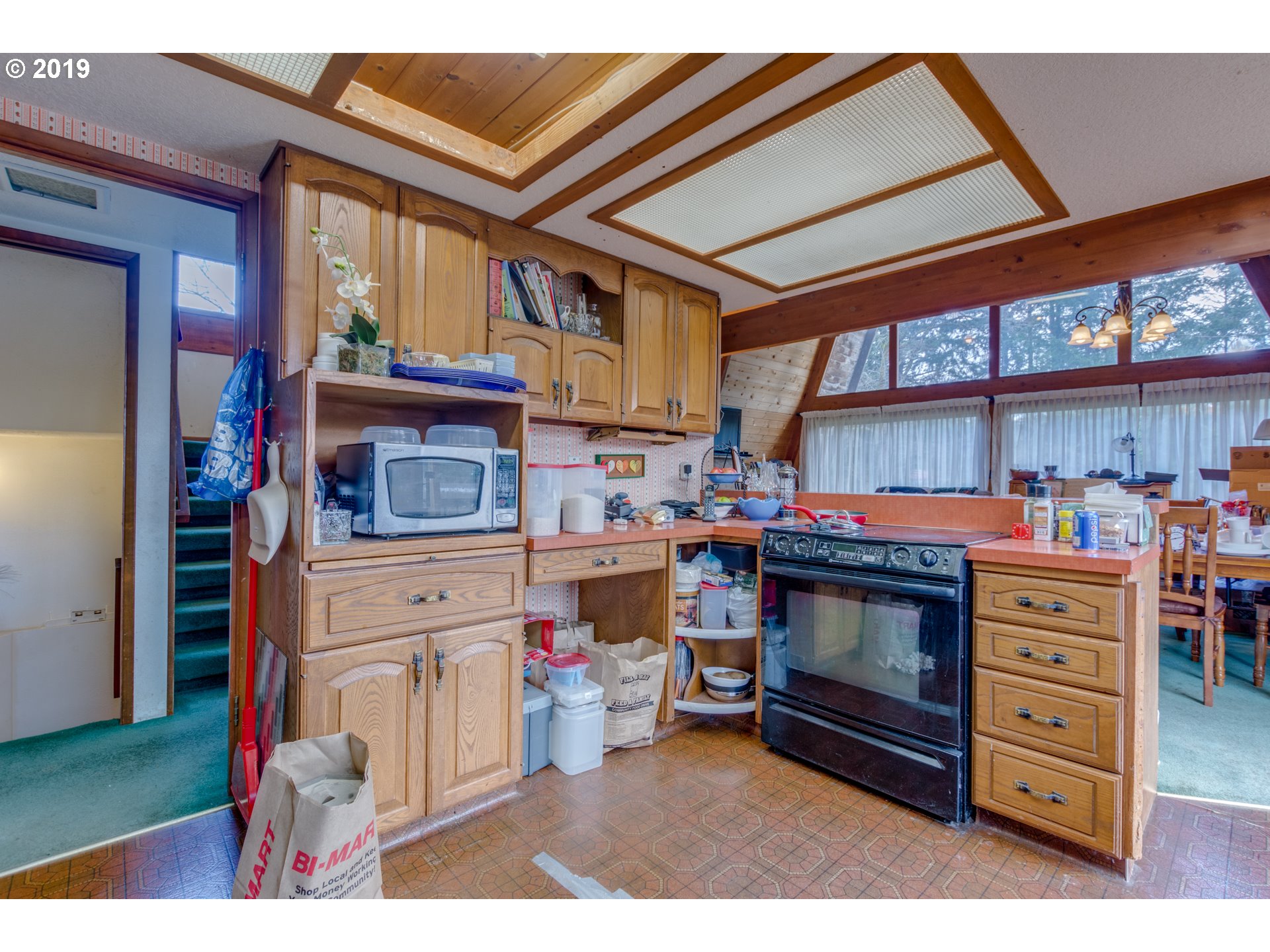 22555 Southeast Bornstedt Road Sandy, OR 97055 - Photo 15 of 32 a kitchen with furniture and a fireplace