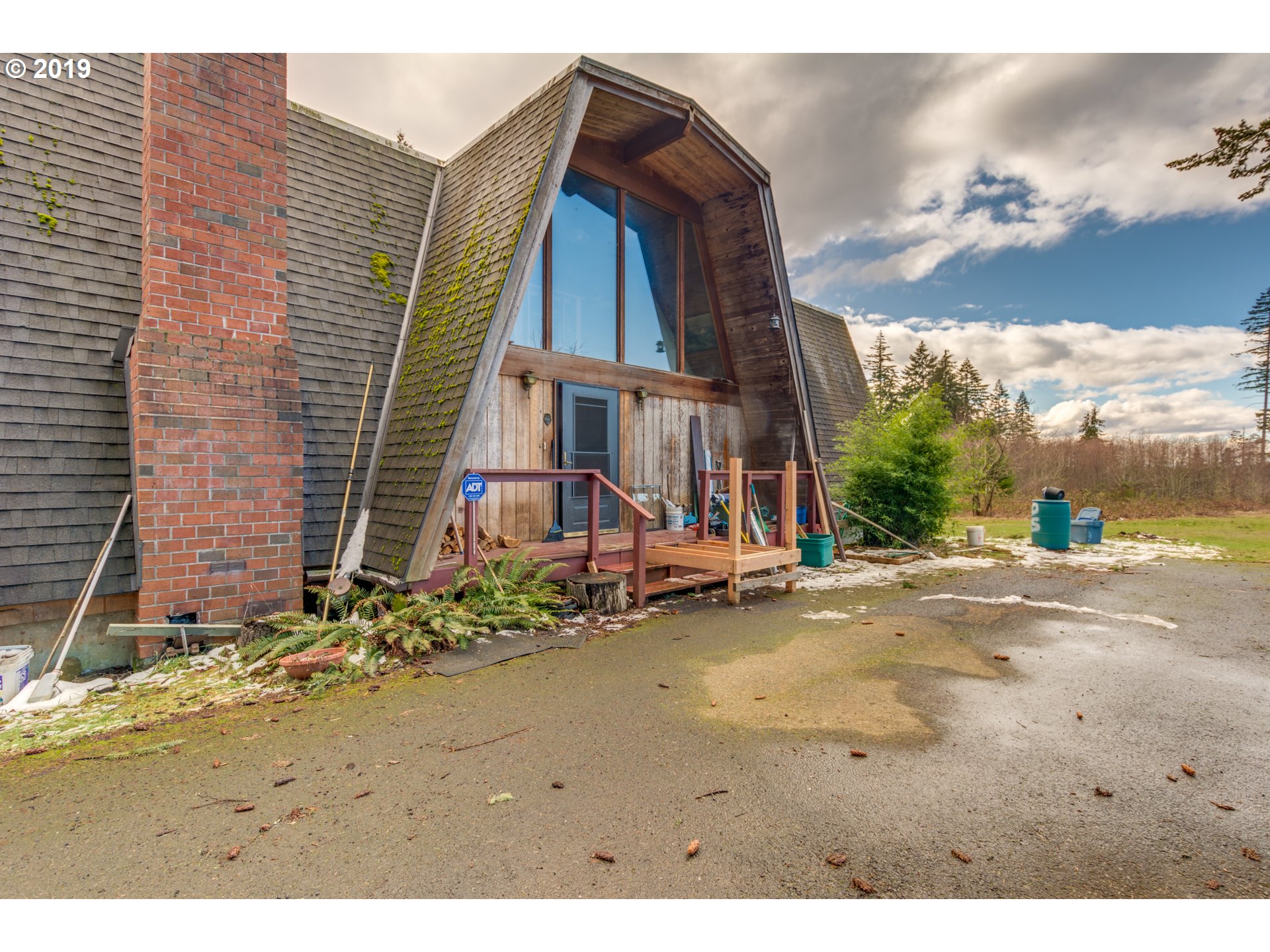 22555 Southeast Bornstedt Road Sandy, OR 97055 - Photo 2 of 32 a view of a house with a yard