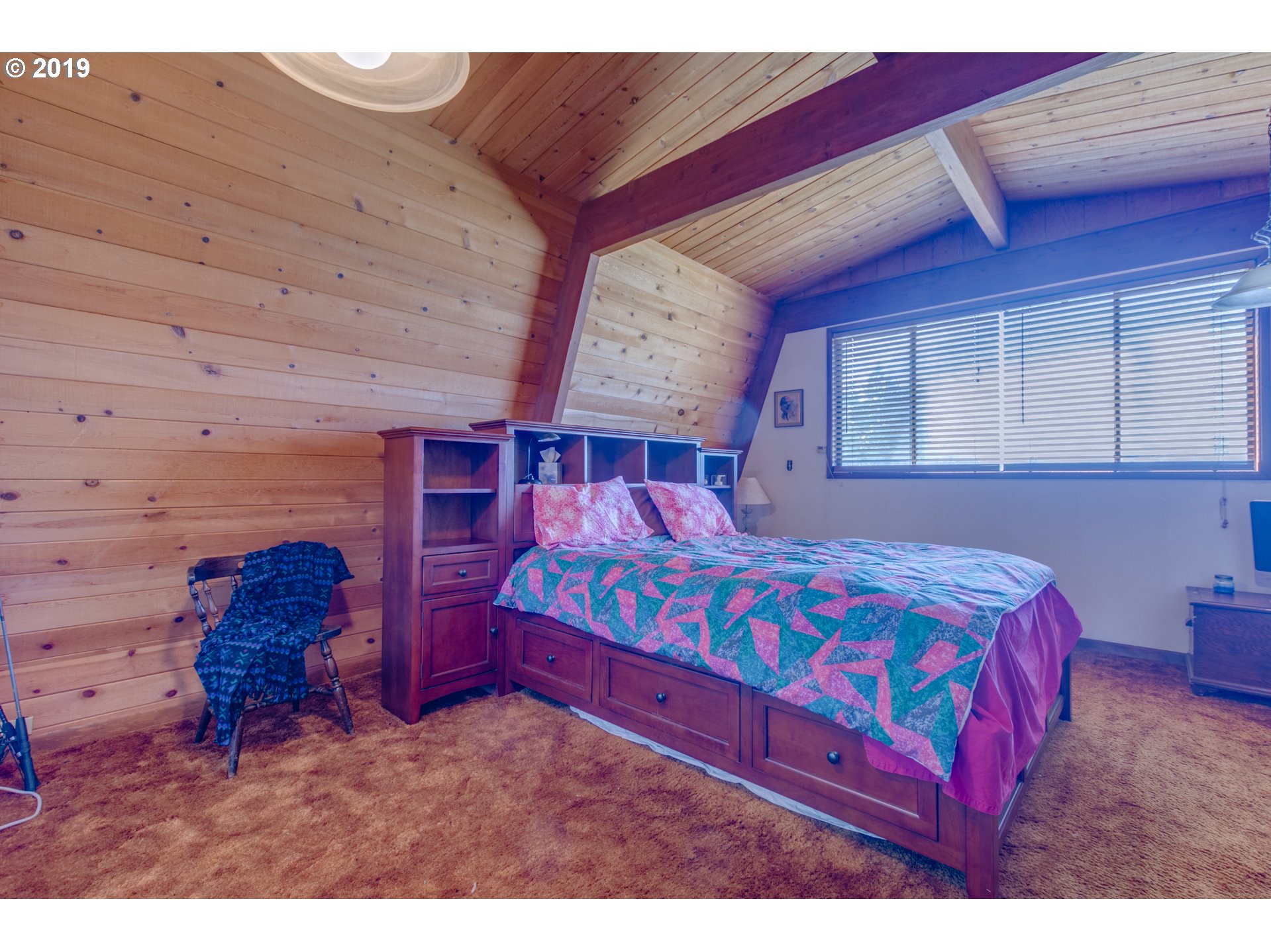 22555 Southeast Bornstedt Road Sandy, OR 97055 - Photo 25 of 32 a bedroom with a bed window and a dresser