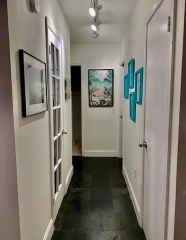 a view of a hallway with a elevator