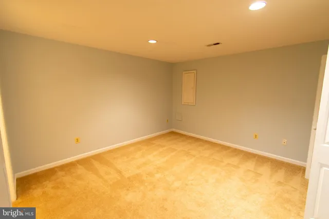 an empty room with a natural light