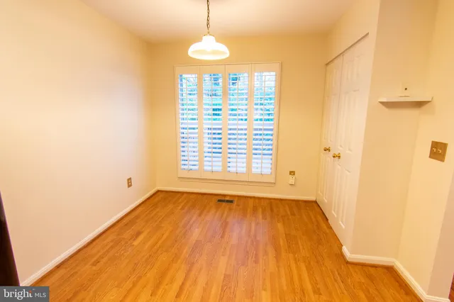 a view of livingroom with hardwood floor and a ceiling fan