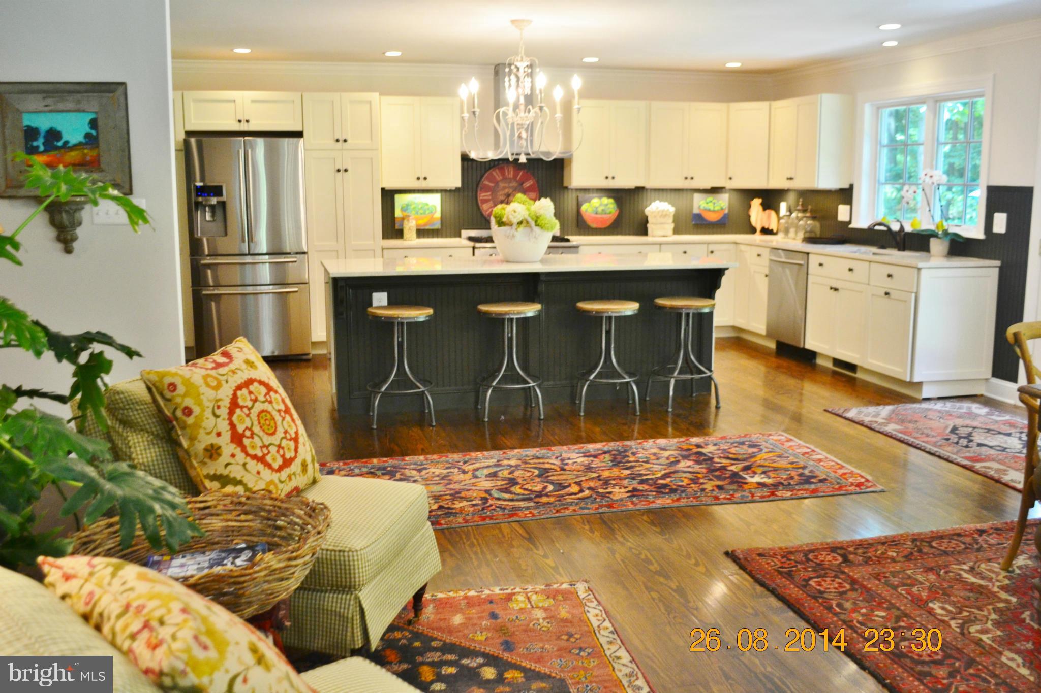 4242 Butler Road Glyndon, MD 21136 - Photo 1 of 29 a kitchen with stainless steel appliances granite countertop a stove a sink and a refrigerator