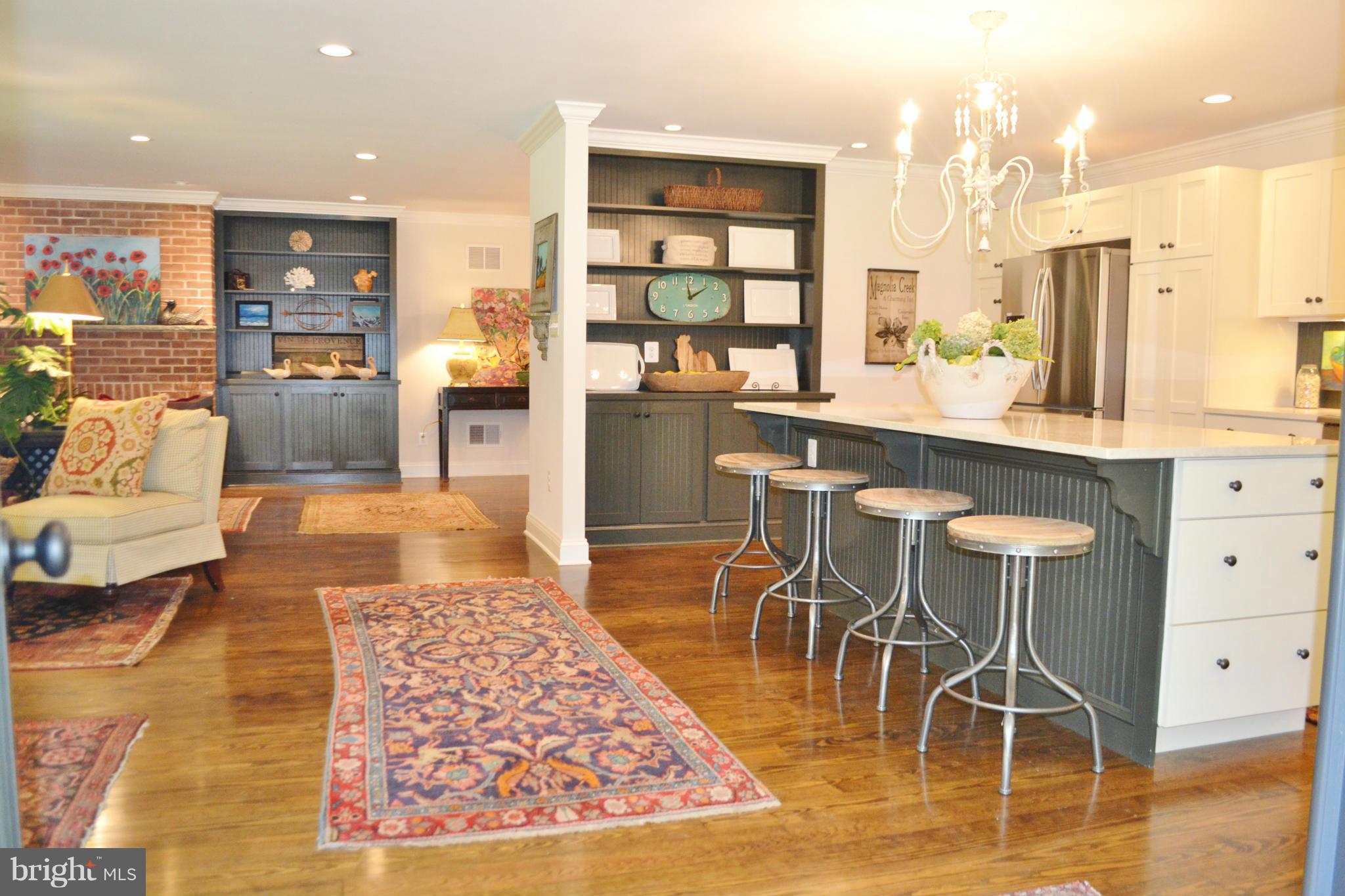 4242 Butler Road Glyndon, MD 21136 - Photo 11 of 29 a large kitchen with a table and chairs in it