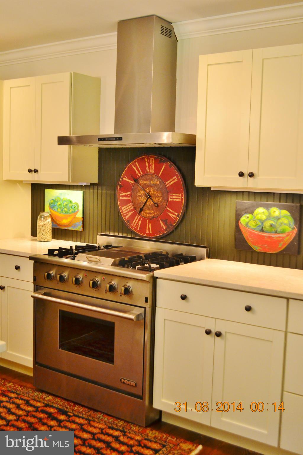 4242 Butler Road Glyndon, MD 21136 - Photo 14 of 29 a stove top oven sitting inside of a kitchen