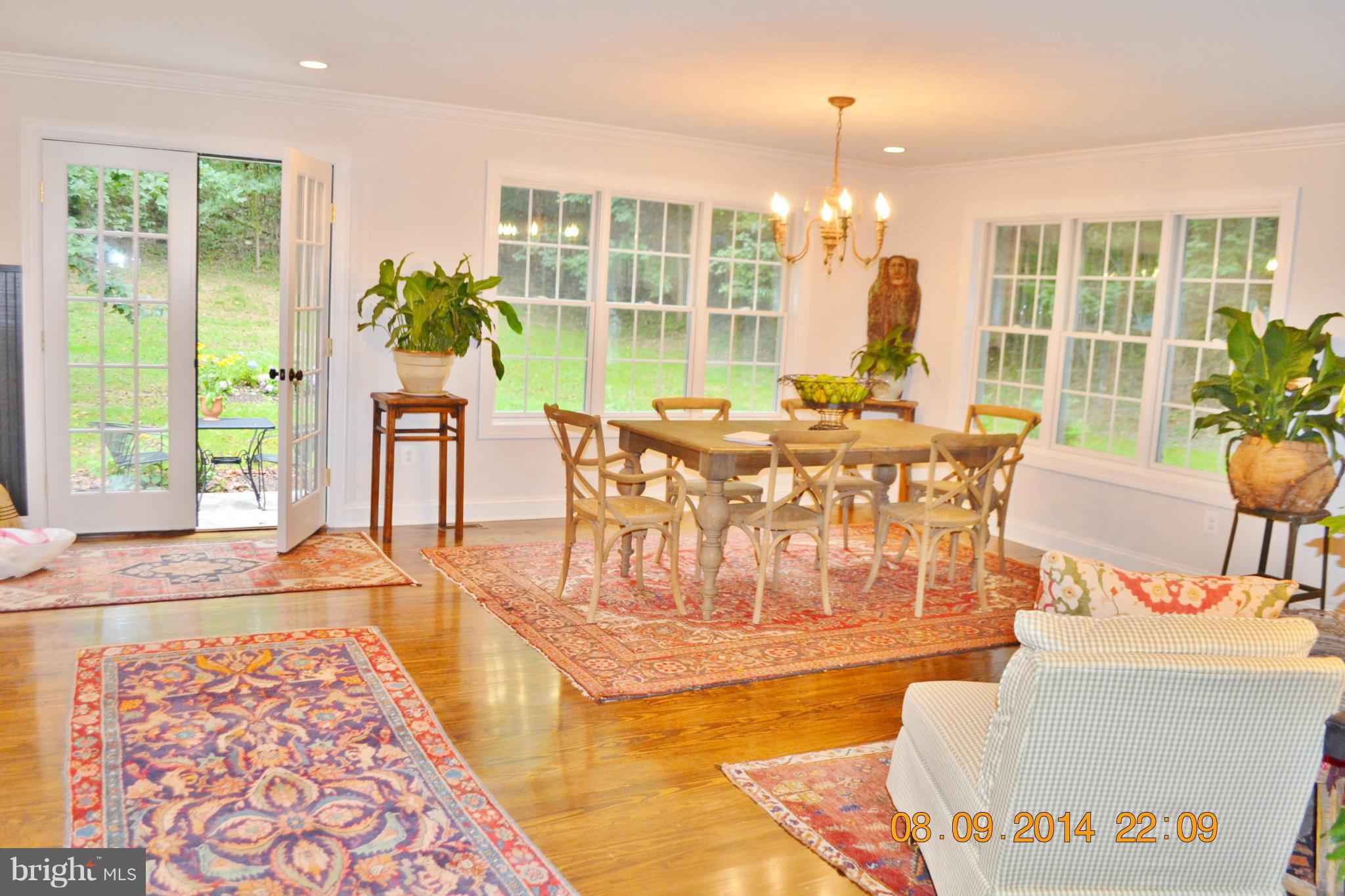4242 Butler Road Glyndon, MD 21136 - Photo 17 of 29 a view of a dining room with furniture window and wooden floor