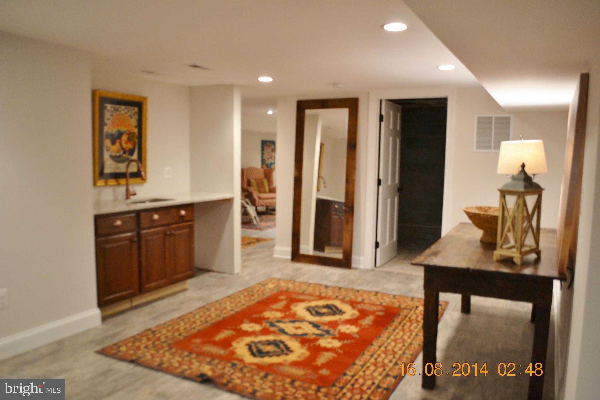 4242 Butler Road Glyndon, MD 21136 - Photo 26 of 29 a view of a hallway with furniture