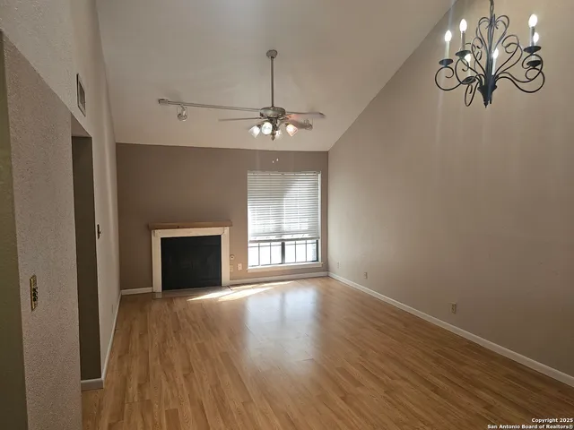 a view of livingroom with window and hardwood floor