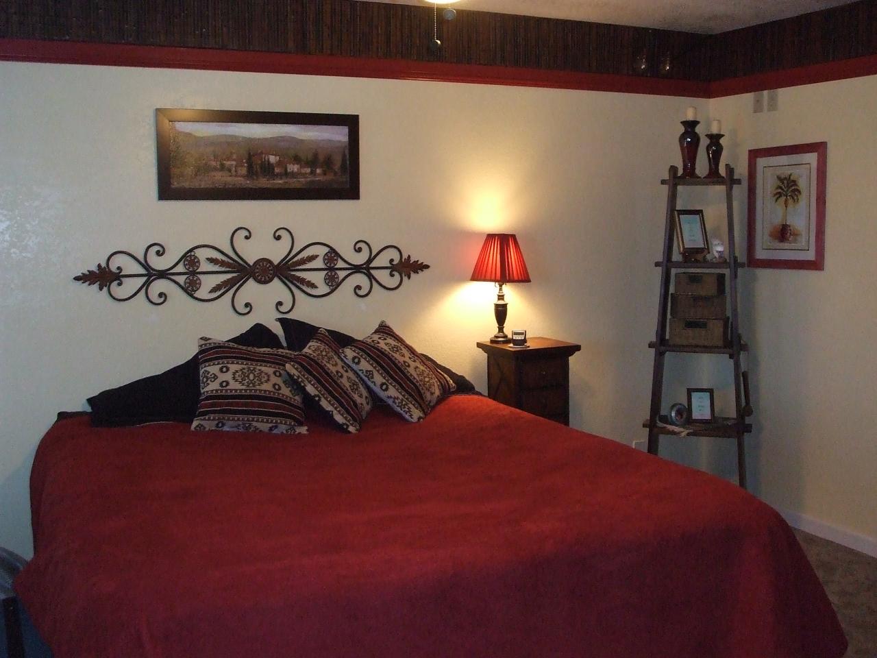 13431 Intermountain Road Redding, CA 96003 - Photo 14 of 49 a bedroom with a bed and a window