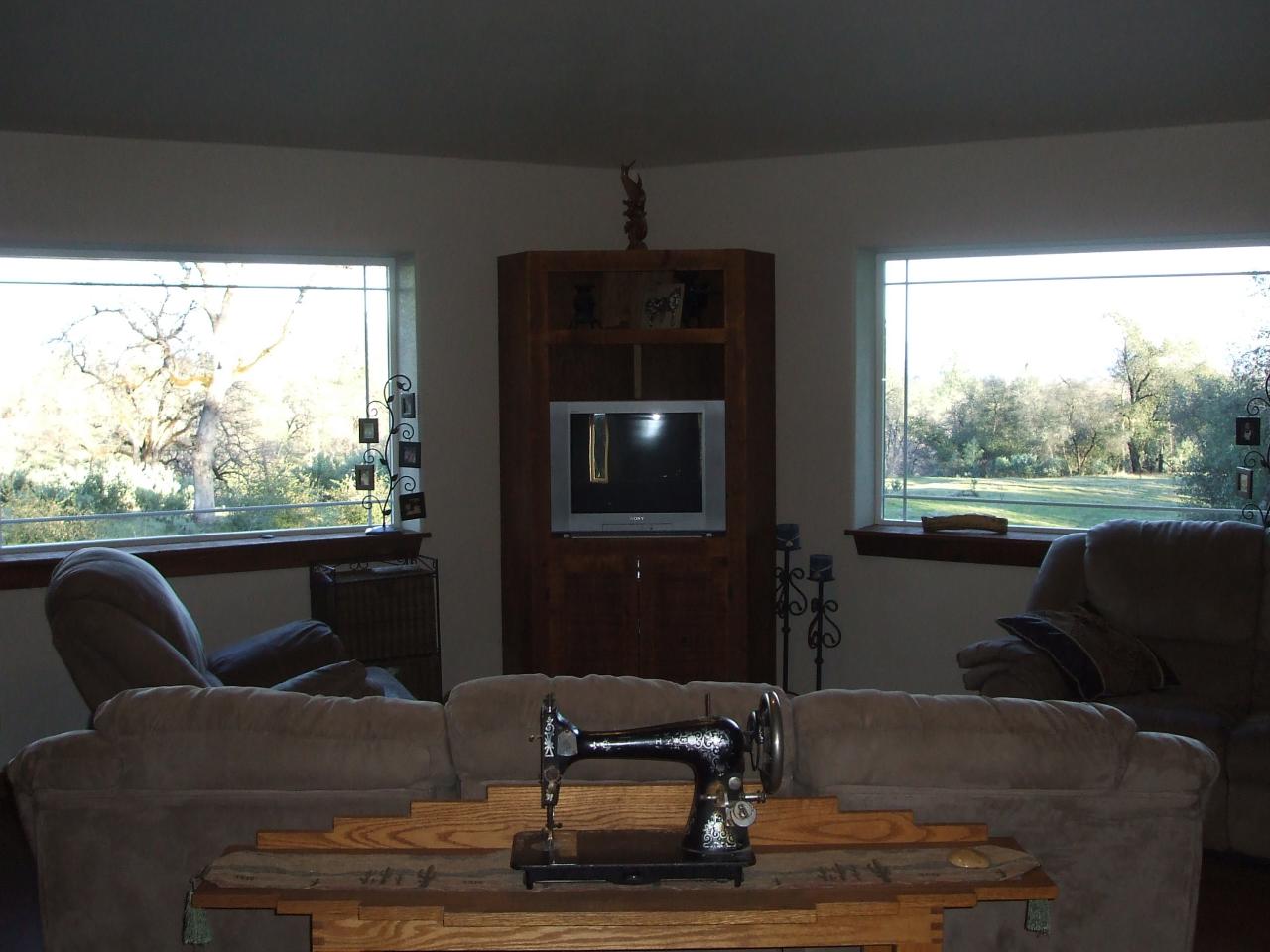 13431 Intermountain Road Redding, CA 96003 - Photo 20 of 49 a living room with furniture and a window