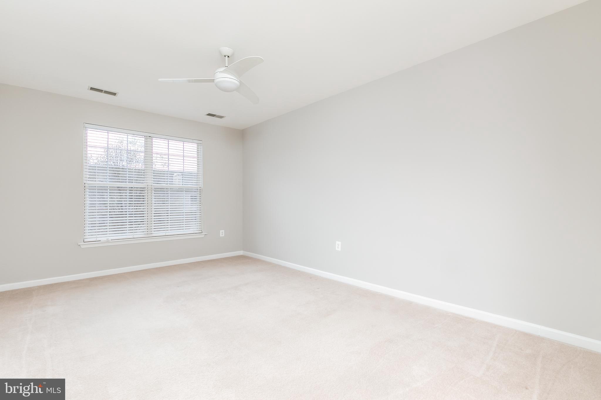4300 Cannon Ridge Court, Unit 15 Fairfax, VA 22033 - Photo 12 of 24 an empty room with a window