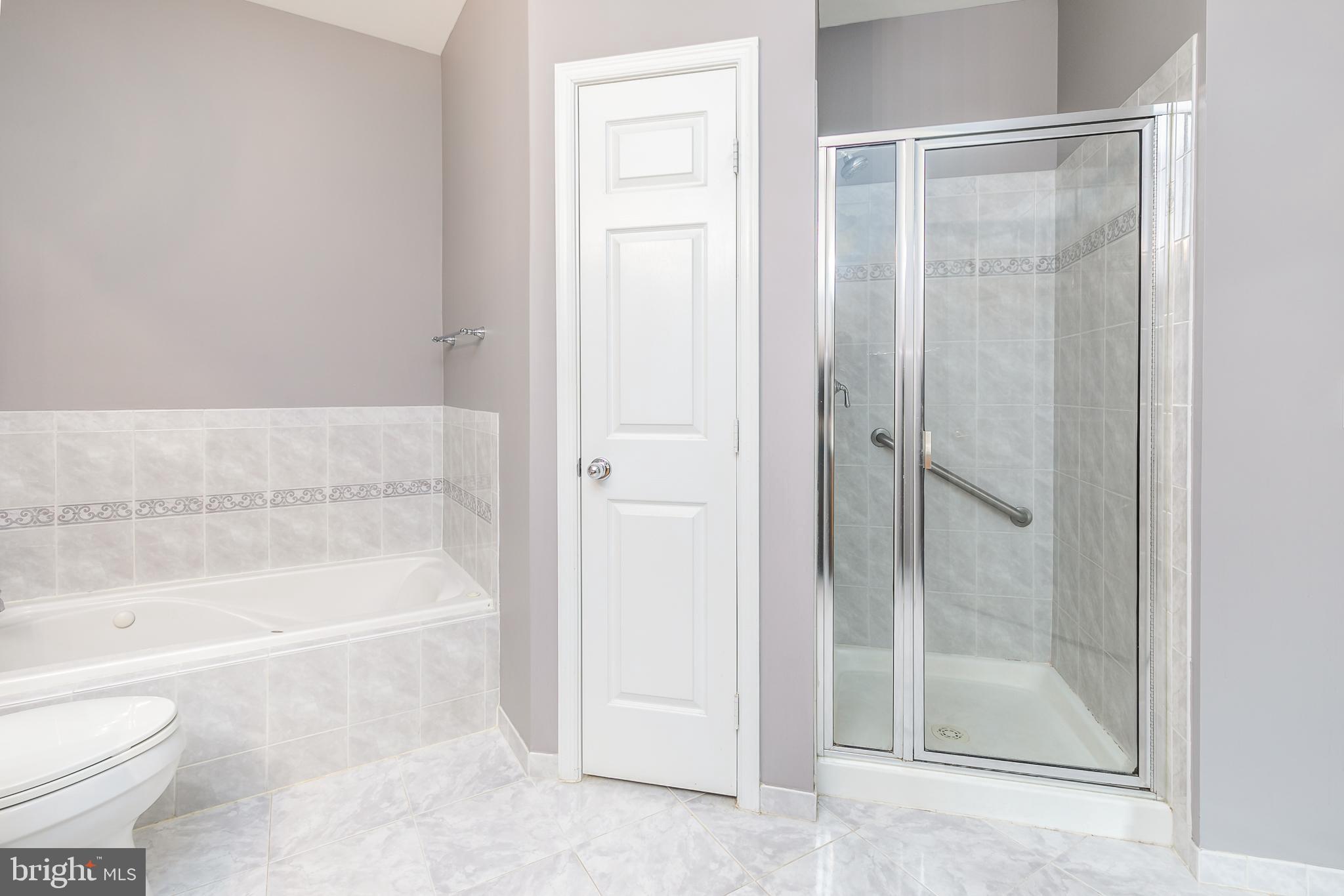 4300 Cannon Ridge Court, Unit 15 Fairfax, VA 22033 - Photo 14 of 24 a bathroom with a bathtub and a shower