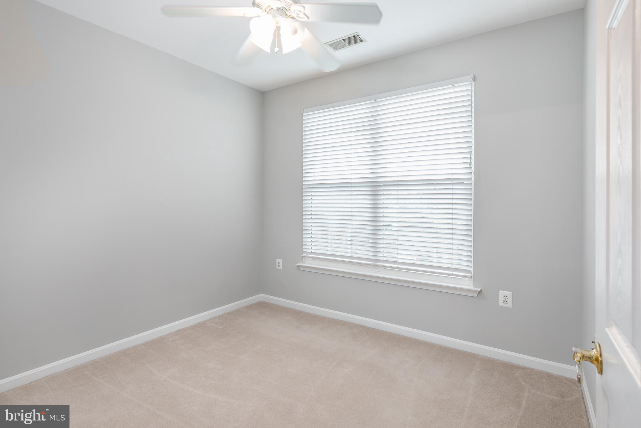 4300 Cannon Ridge Court, Unit 15 Fairfax, VA 22033 - Photo 22 of 24 an empty room with a window