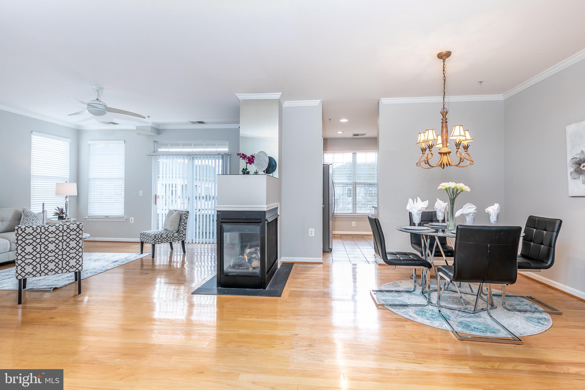 4300 Cannon Ridge Court, Unit 15 Fairfax, VA 22033 - Photo 4 of 24 a living room with furniture and a wooden floor