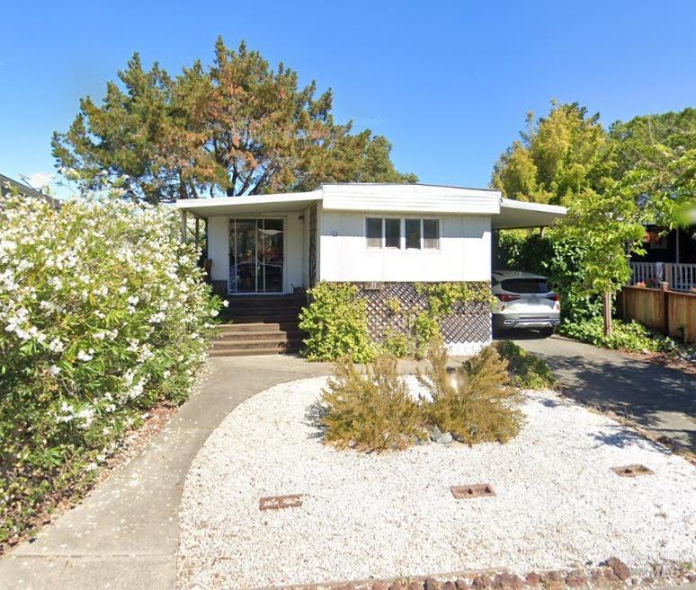 31 Yosemite Road San Rafael, CA 94903 - Photo 1 of 1 a front view of a house with a yard