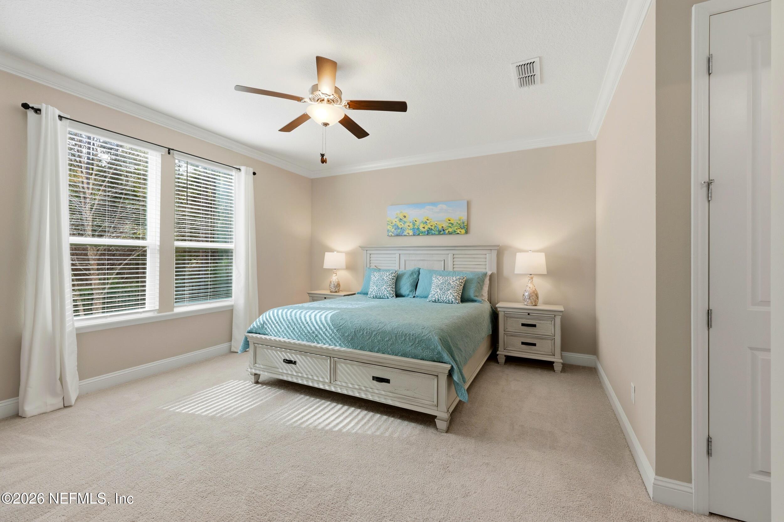 25 Waterbrook Place St. Augustine, FL 32095 - Photo 13 of 55 a bedroom with a bed and window