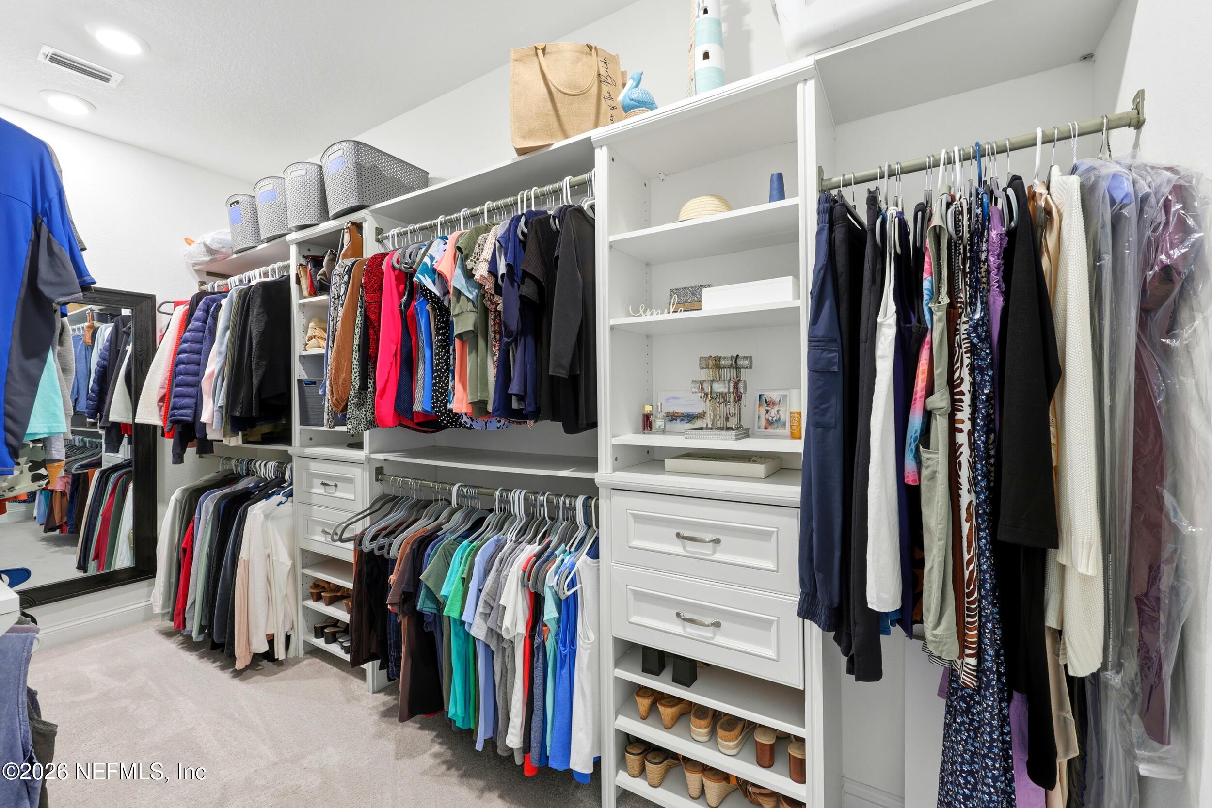 25 Waterbrook Place St. Augustine, FL 32095 - Photo 16 of 55 a view of walk in closet with clothes