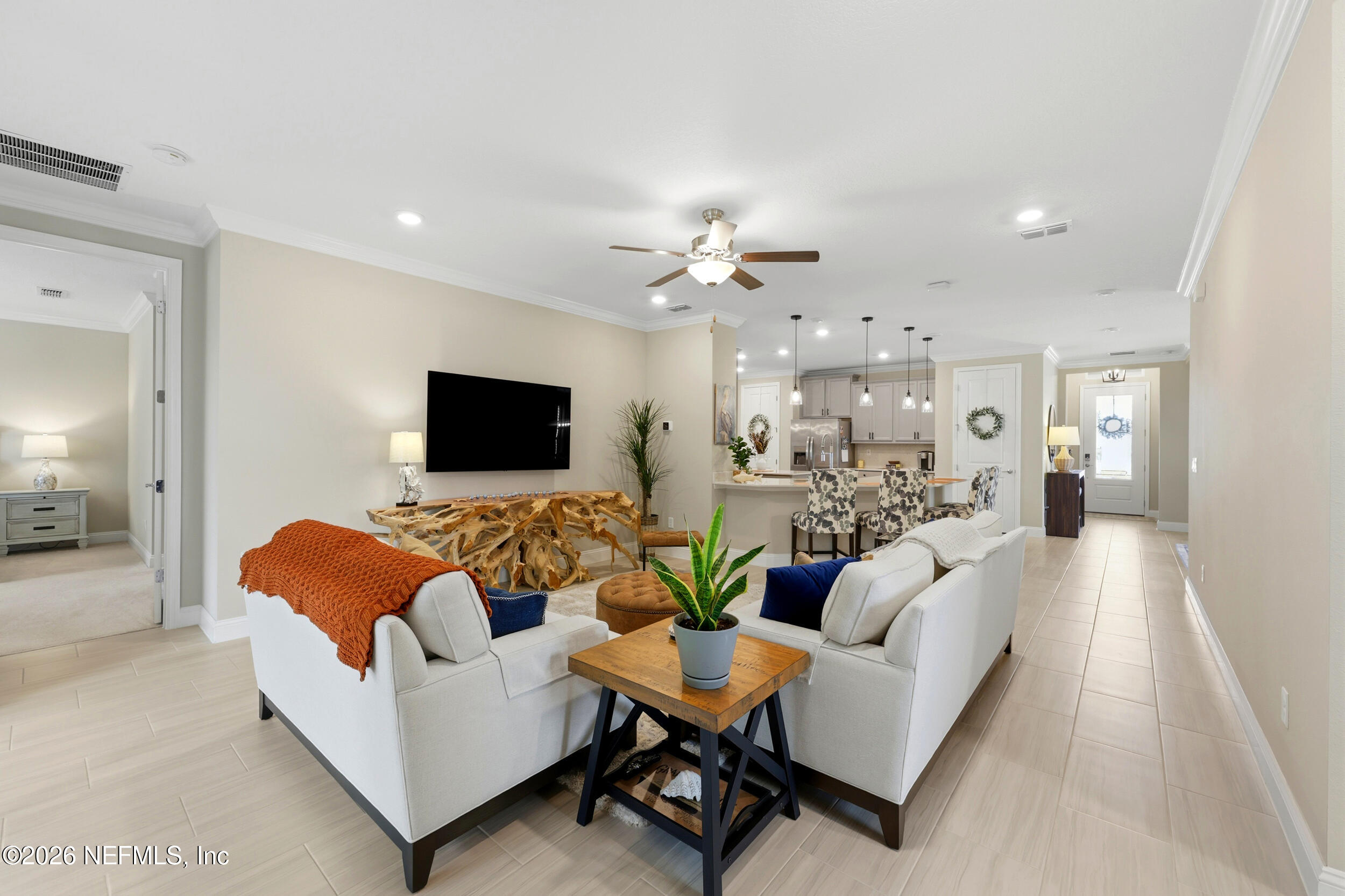 25 Waterbrook Place St. Augustine, FL 32095 - Photo 26 of 55 a living room with furniture and a flat screen tv