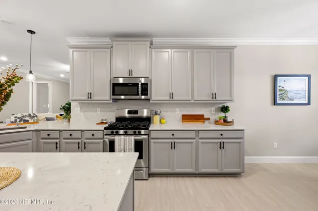 a view of storage and utility room with washer and dryer