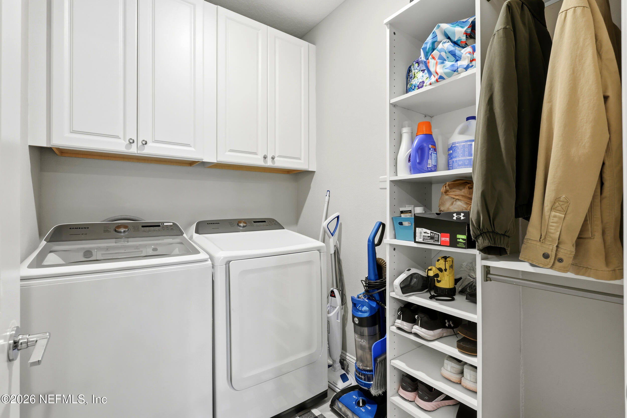 25 Waterbrook Place St. Augustine, FL 32095 - Photo 37 of 55 a view of storage and utility room with washer and dryer