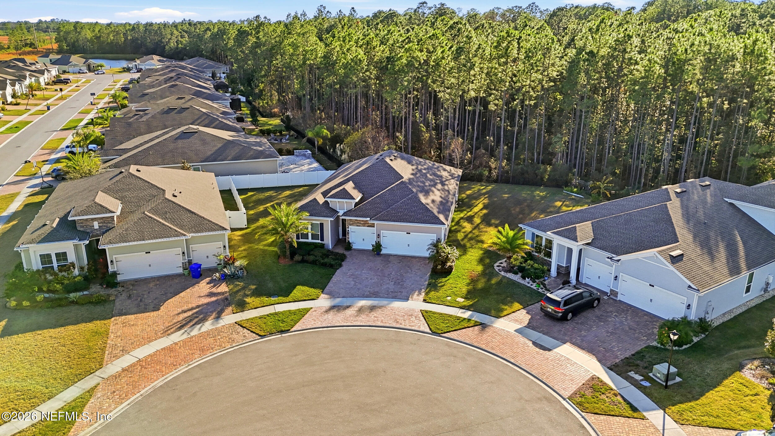 25 Waterbrook Place St. Augustine, FL 32095 - Photo 45 of 55 an aerial view of a house with swimming pool and garden