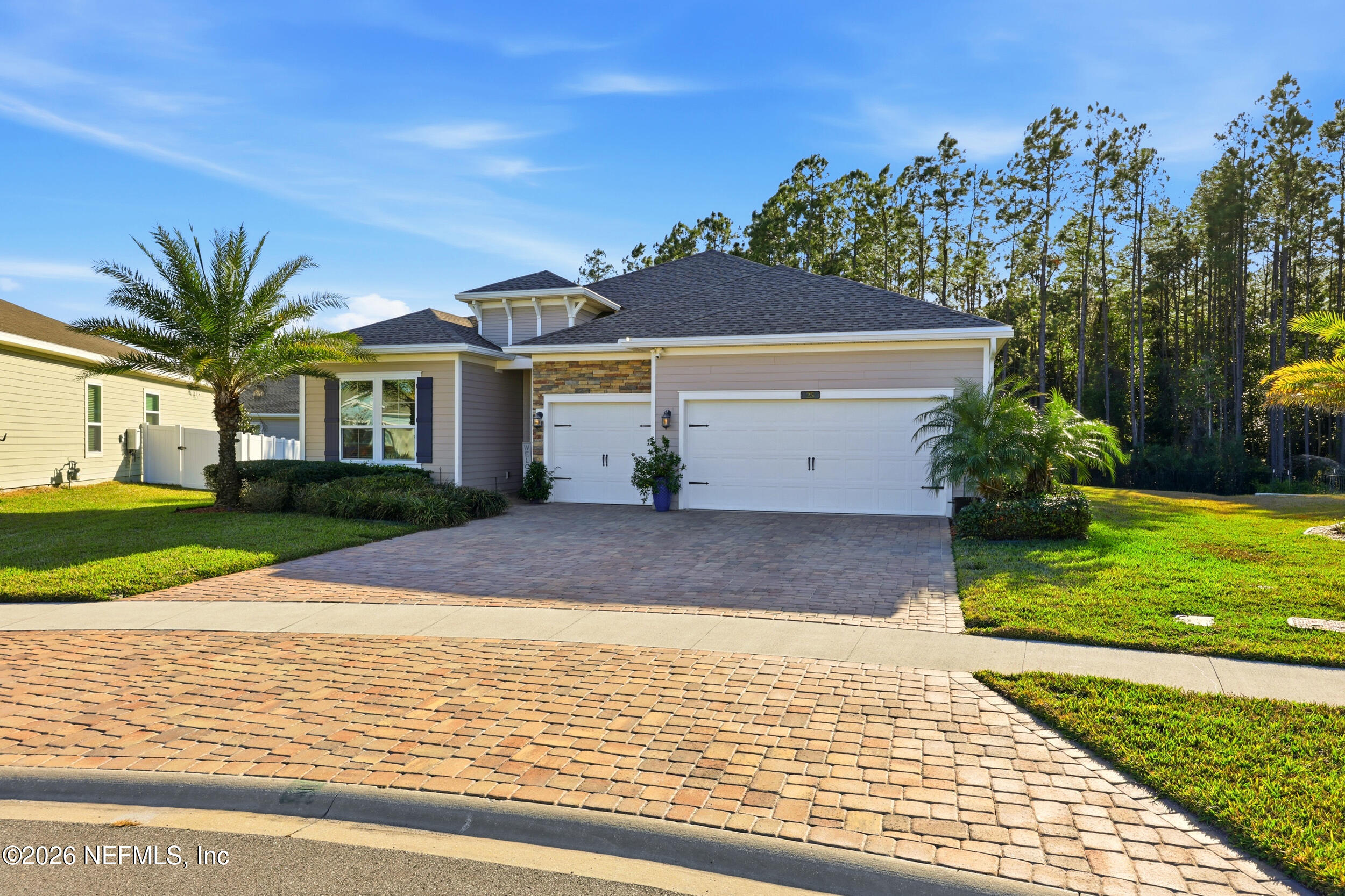 25 Waterbrook Place St. Augustine, FL 32095 - Photo 50 of 55 a view of a white house with a yard