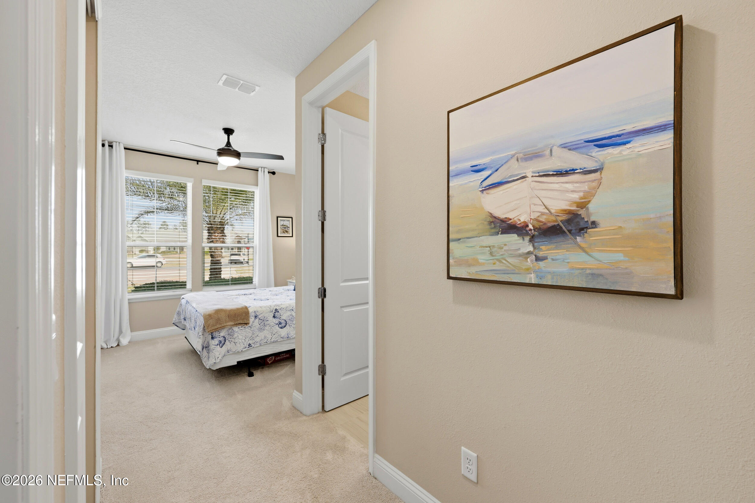 25 Waterbrook Place St. Augustine, FL 32095 - Photo 5 of 55 a view of a bedroom with bed and wooden floor