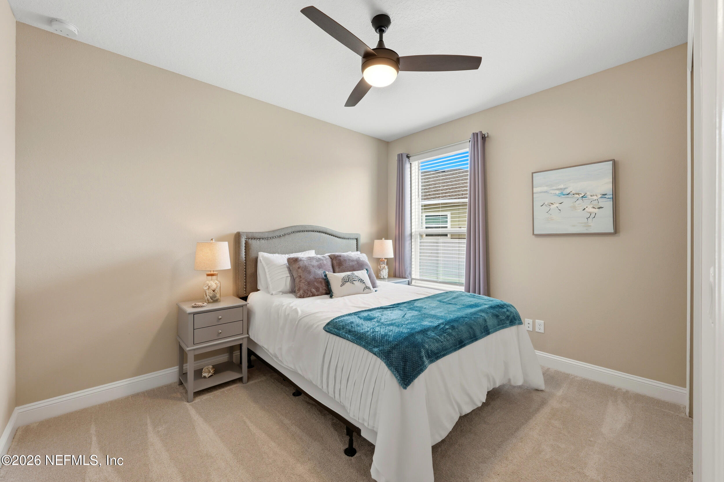 25 Waterbrook Place St. Augustine, FL 32095 - Photo 10 of 55 a bedroom with a bed and a ceiling fan