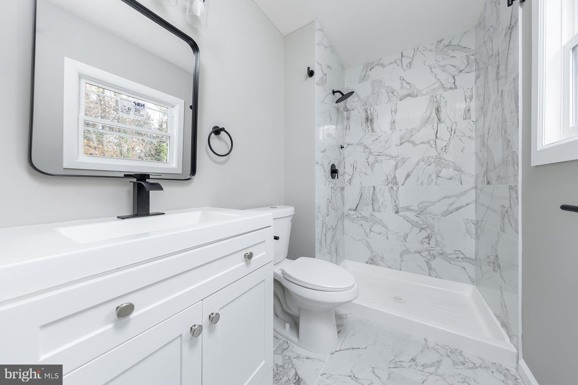 210 Stratton Court Mount Laurel, NJ 08054 - Photo 15 of 20 a bathroom with a sink a toilet and a bathtub