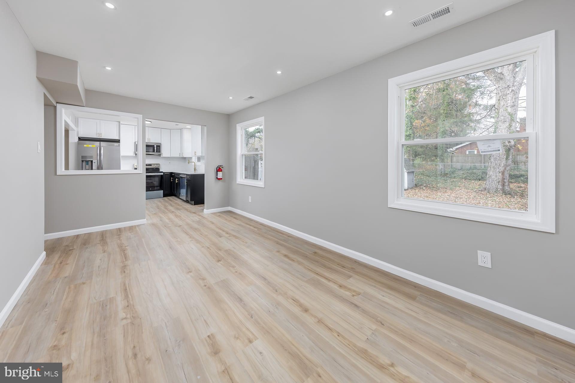 210 Stratton Court Mount Laurel, NJ 08054 - Photo 10 of 20 a view of a kitchen with microwave and windows