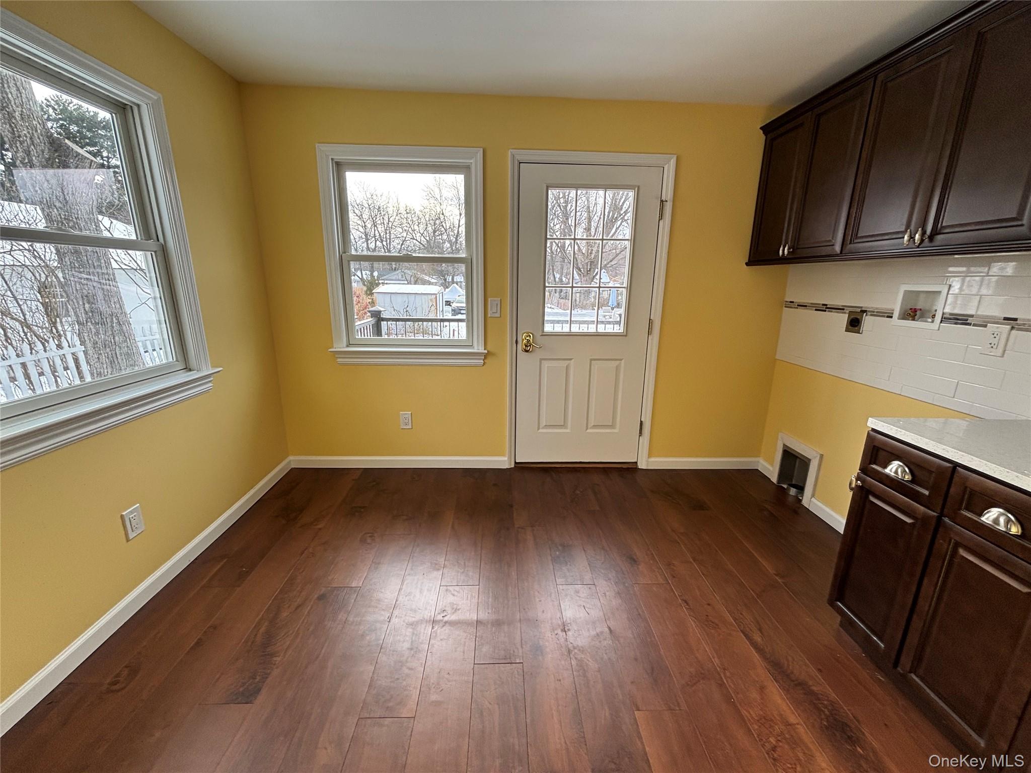 45 Waterstone Road, Unit 1 Greenwood Lake, NY 10925 - Photo 11 of 17 Off of the Kitchen with the Laundry Hookup Looking Towards the Deck & Backyard